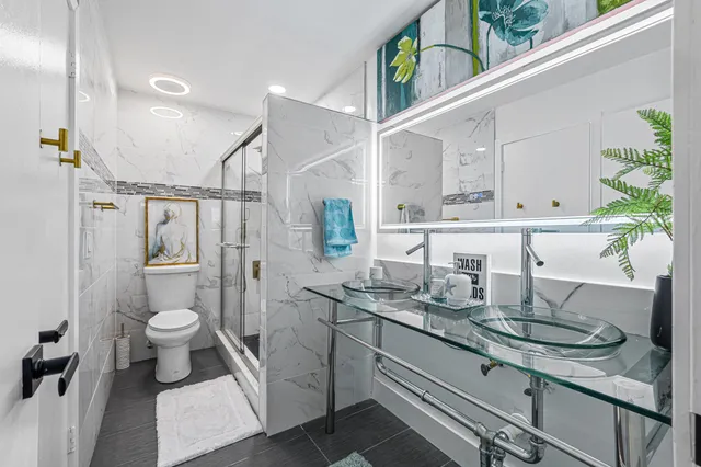 a room with a book shelf and wooden floor