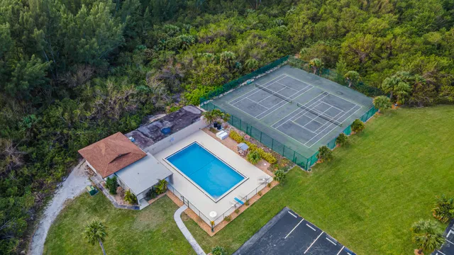 a view of parking space with parked cars