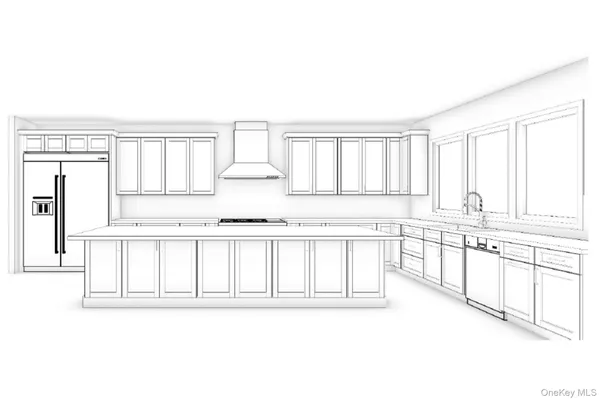 a large white kitchen with granite countertop a large white cabinets and a large window