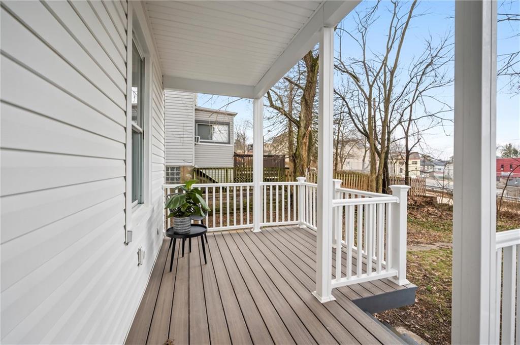 8 Marie Avenue Avalon, PA 15202 - Photo 17 of 48 a view of a wooden deck and a yard