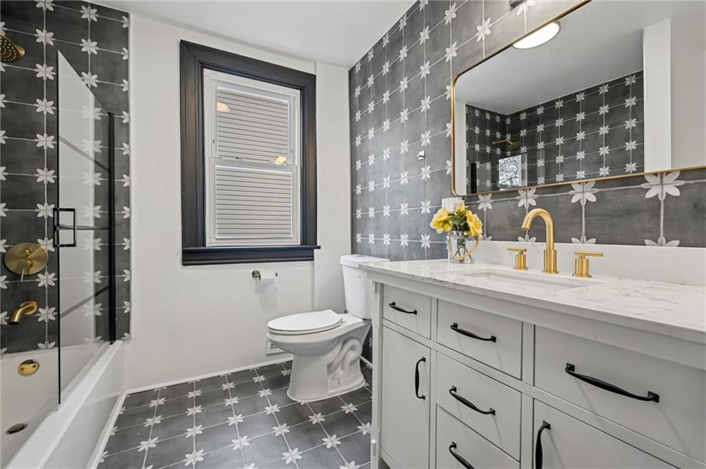 8 Marie Avenue Avalon, PA 15202 - Photo 28 of 48 a bathroom with a sink a toilet and shower