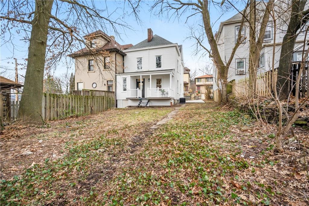 8 Marie Avenue Avalon, PA 15202 - Photo 39 of 48 a view of a big house with a big yard and large tree