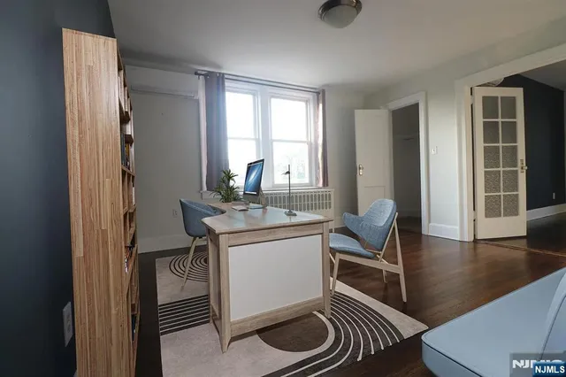 a living room with a sink and a window