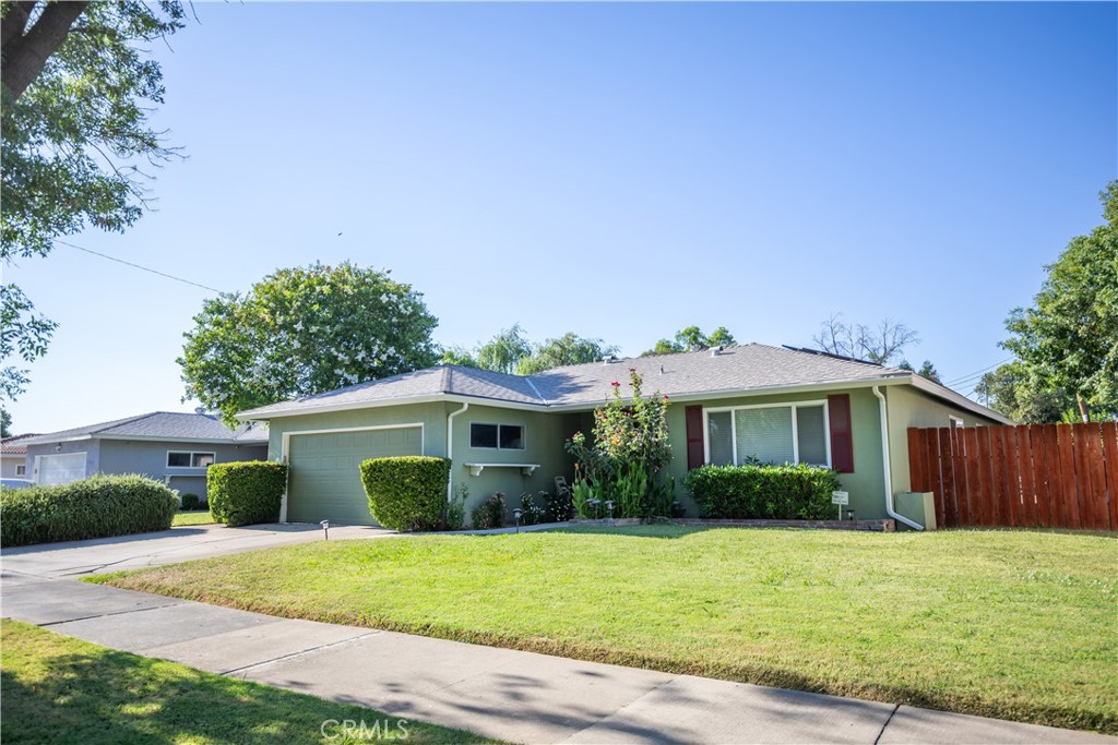 847 Seneca Street Merced, CA 95340 - Photo 4 of 6 a front view of a house with a garden