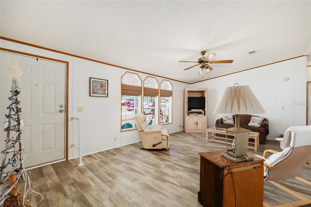 2335 North Loma Point Hernando, FL 34442 - Photo 13 of 47 a view of a livingroom with furniture and a flat screen tv