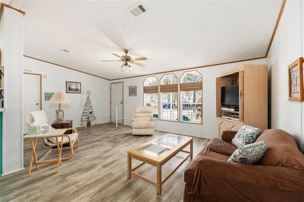 a living room with furniture and a table