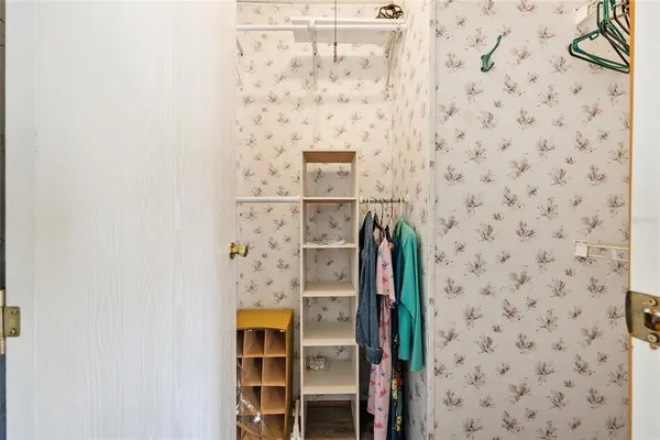 a bathroom with a shower and a sink