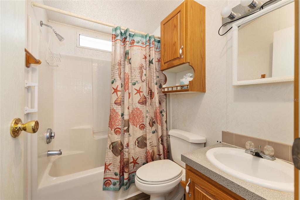 2335 North Loma Point Hernando, FL 34442 - Photo 24 of 47 a bathroom with a sink toilet and shower