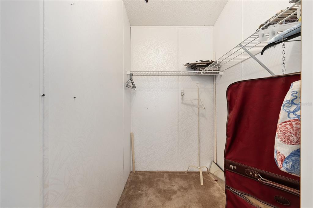 2335 North Loma Point Hernando, FL 34442 - Photo 27 of 47 a view of walk in closet with clothes