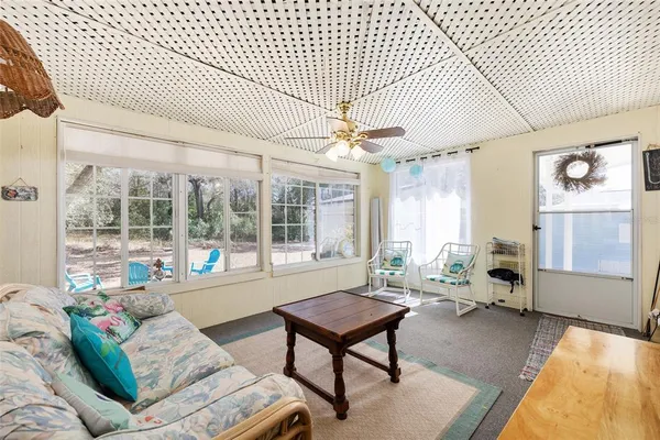 a living room with furniture and a table