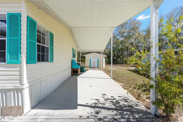 a view of house with yard