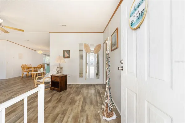 a view of livingroom with furniture and wooden floor