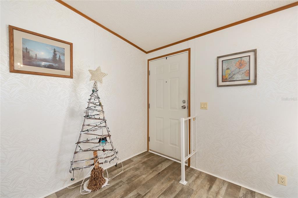 2335 North Loma Point Hernando, FL 34442 - Photo 10 of 47 a view of an entryway with wooden floor