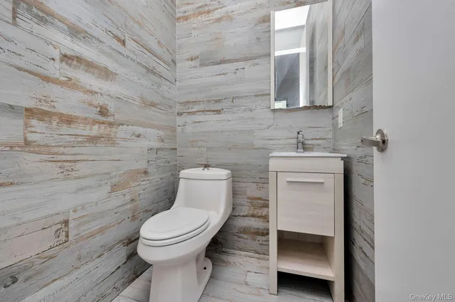 a kitchen with stainless steel appliances a sink and a microwave