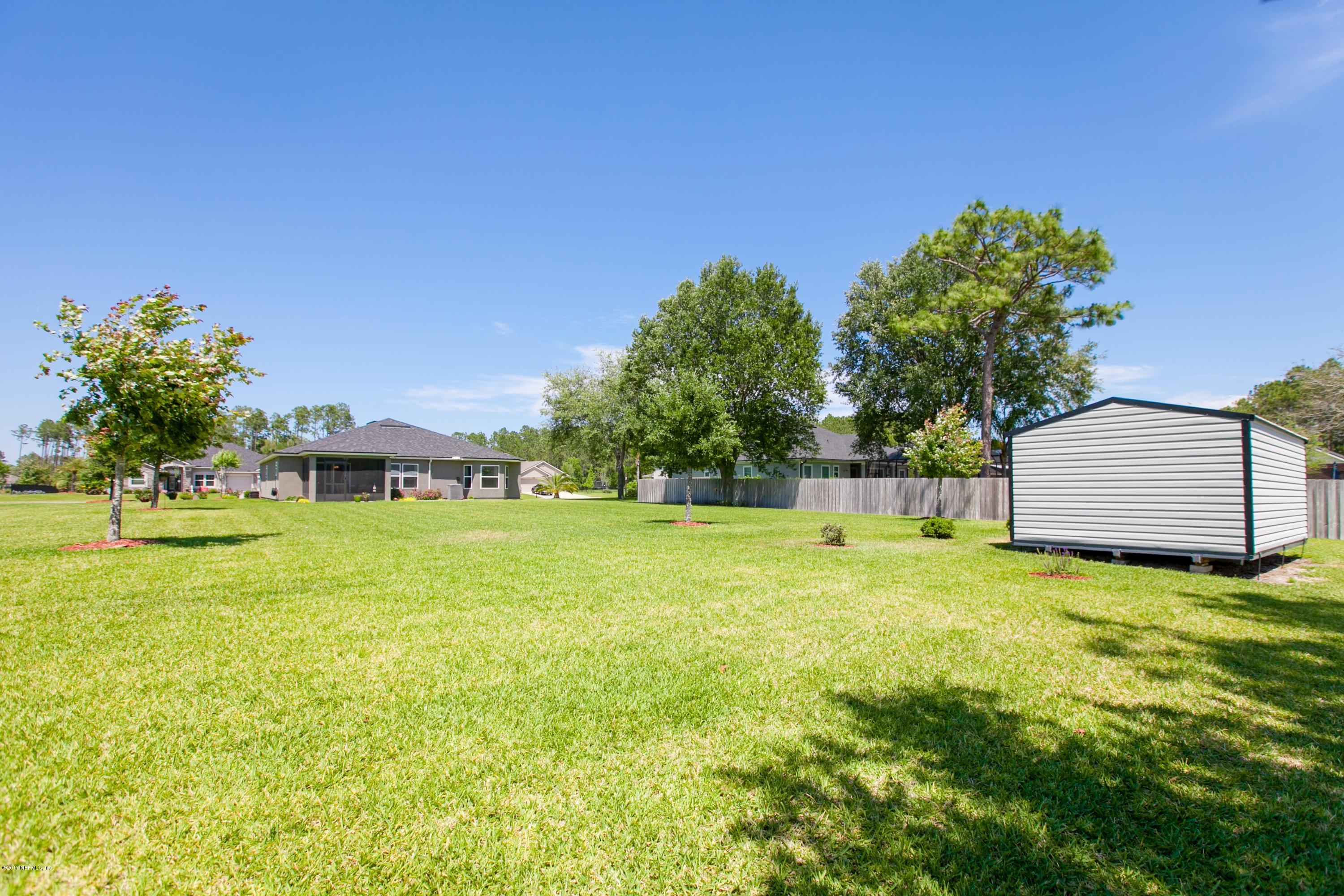 490 Irish Rose Road St. Augustine, FL 32092 - Photo 32 of 44 a garden view
