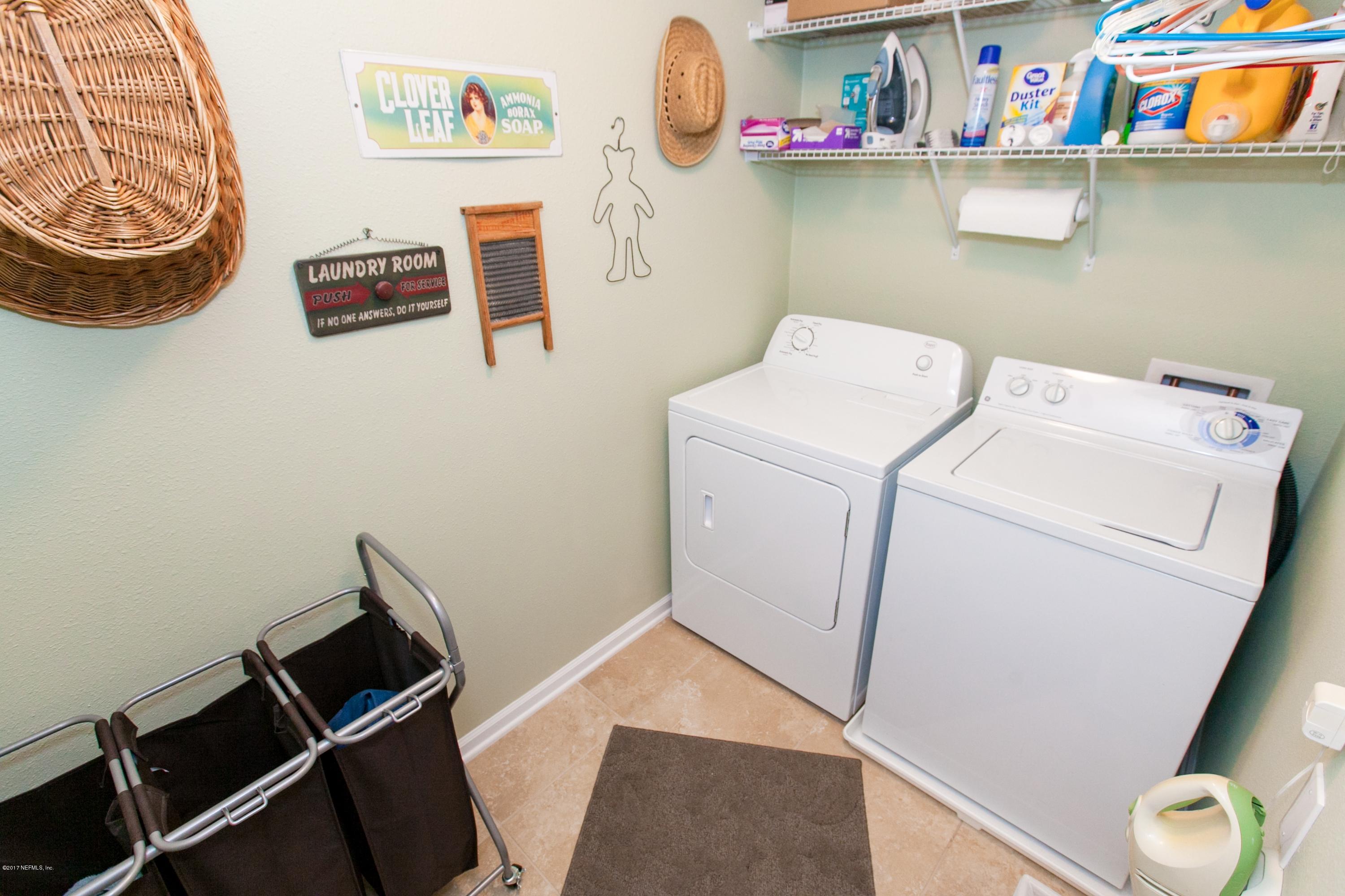 490 Irish Rose Road St. Augustine, FL 32092 - Photo 38 of 44 a utility room with dryer and washer