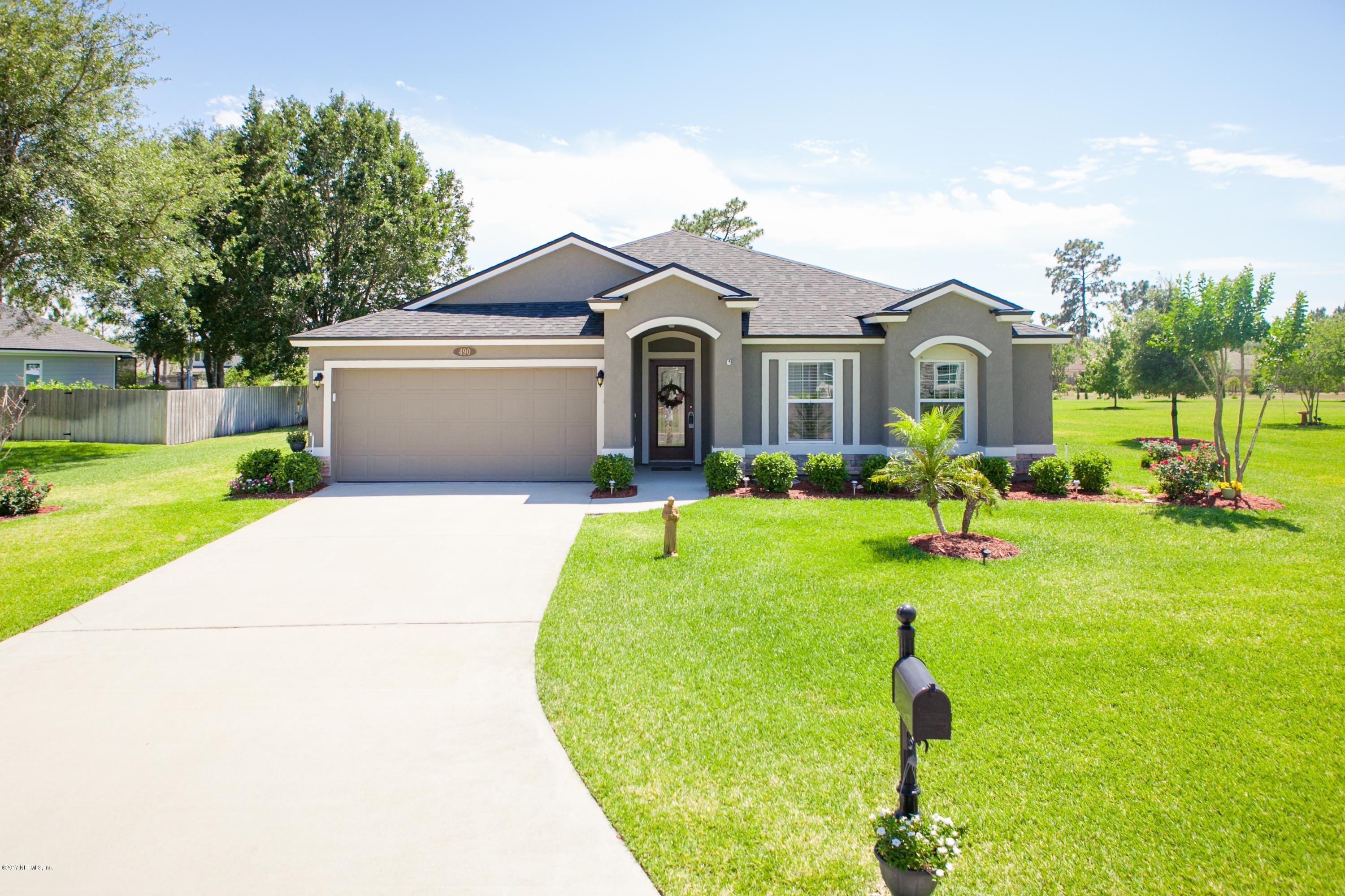 490 Irish Rose Road St. Augustine, FL 32092 - Photo 43 of 44 a view of a front of a house with a yard