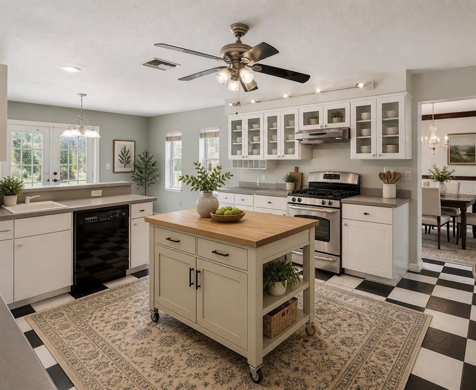 15420 Aubrey Avenue Spring Hill, FL 34610 - Photo 7 of 28 a kitchen with a stove and a sink