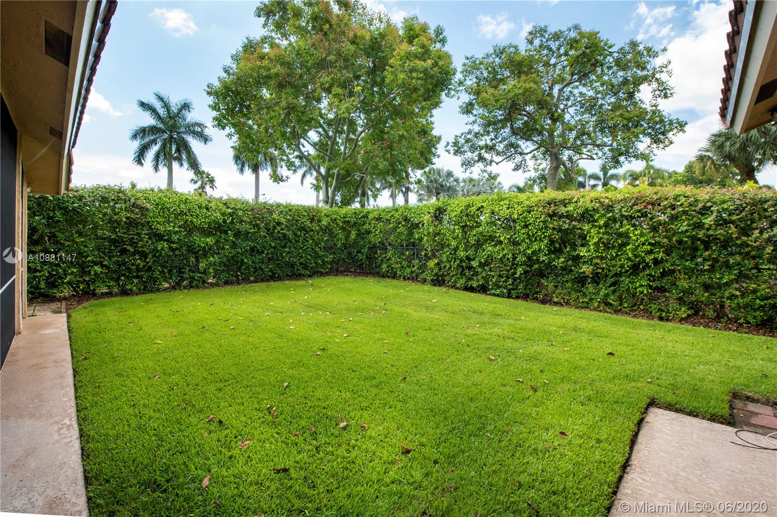 12346 Baywind Court Boca Raton, FL 33428 - Photo 28 of 31 a view of a yard with a tree
