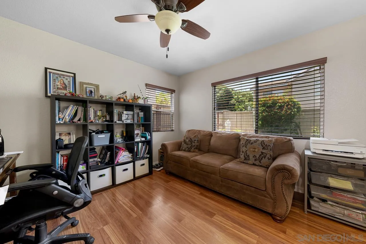 1631 Applegate Street Chula Vista, CA 91913 - Photo 28 of 34 a living room with furniture and a window