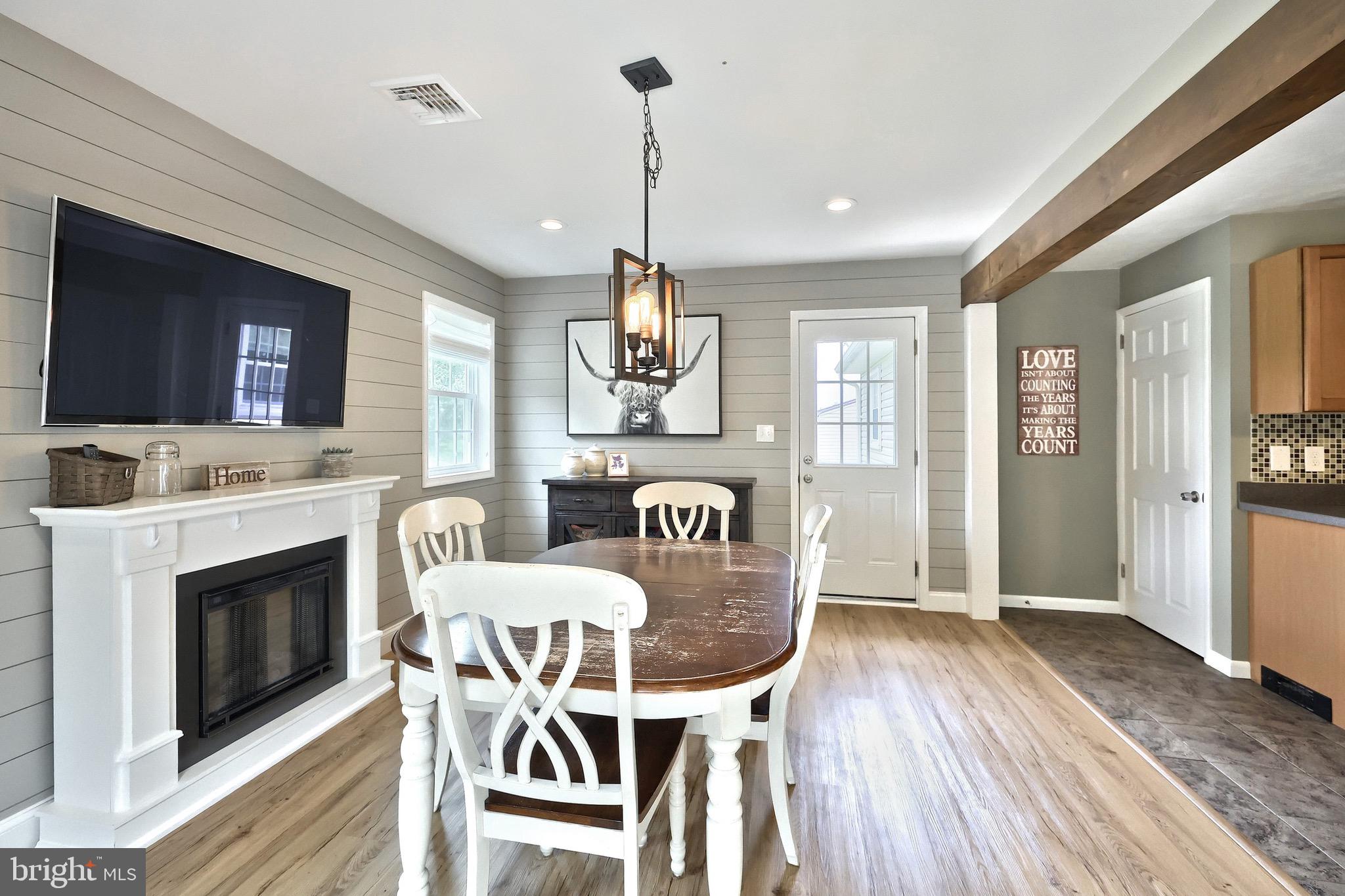 2569 Emig Mill Road Dover, PA 17315 - Photo 17 of 32 a view of a dining room with furniture window and wooden floor