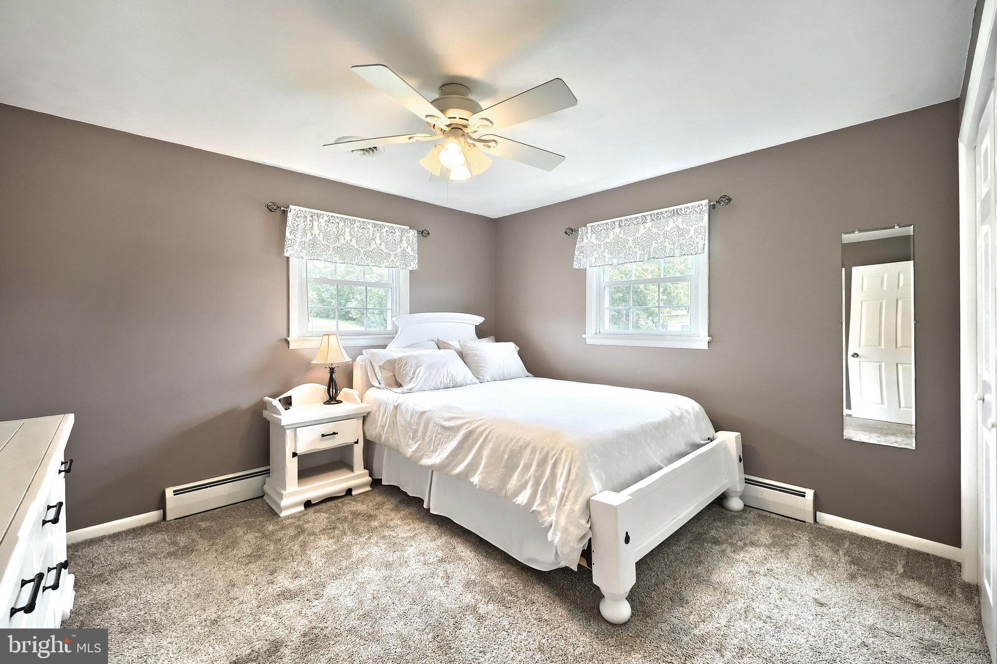 2569 Emig Mill Road Dover, PA 17315 - Photo 23 of 32 a spacious bedroom with a bed and window