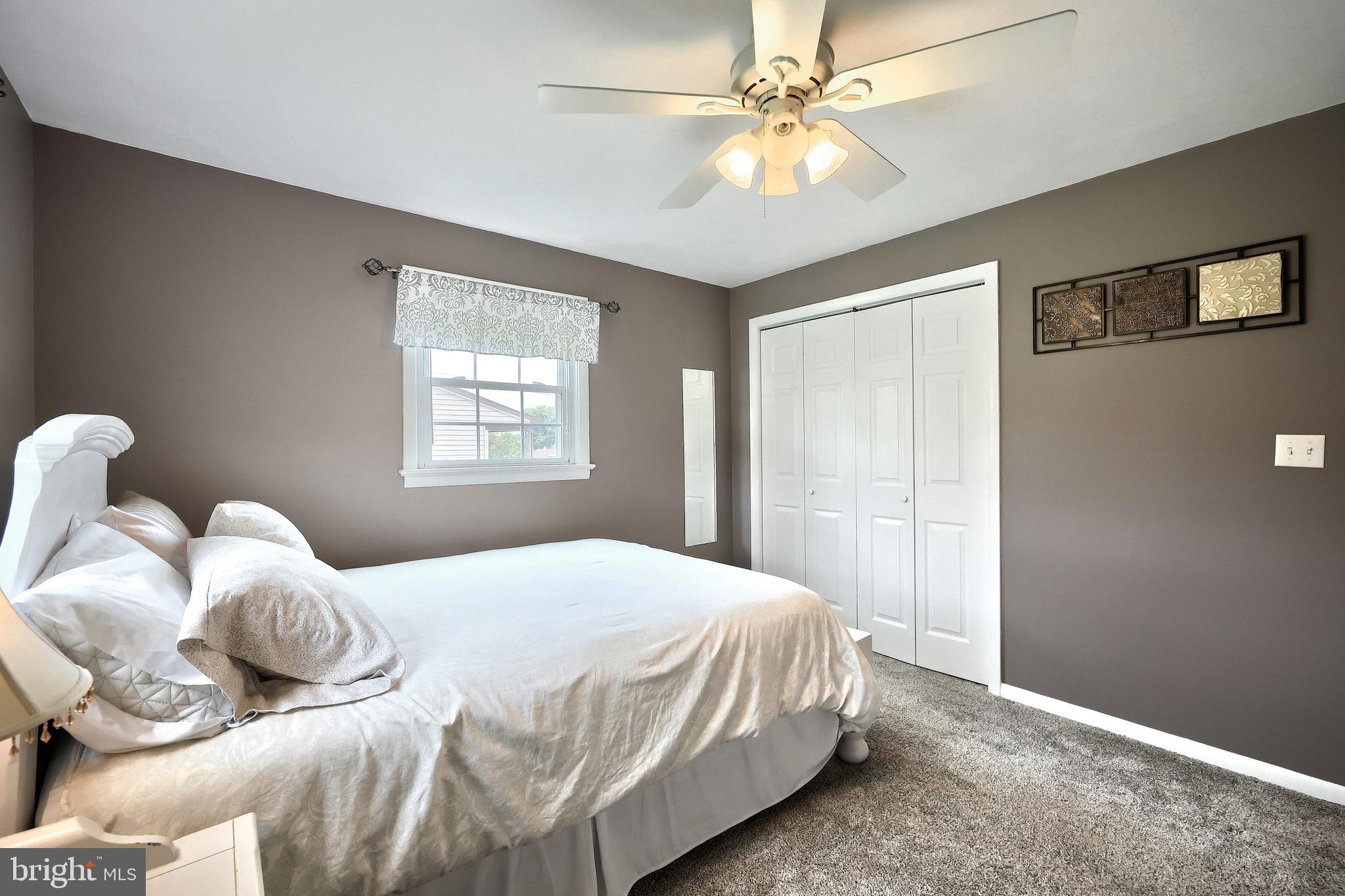 2569 Emig Mill Road Dover, PA 17315 - Photo 24 of 32 a bedroom with bed and a window