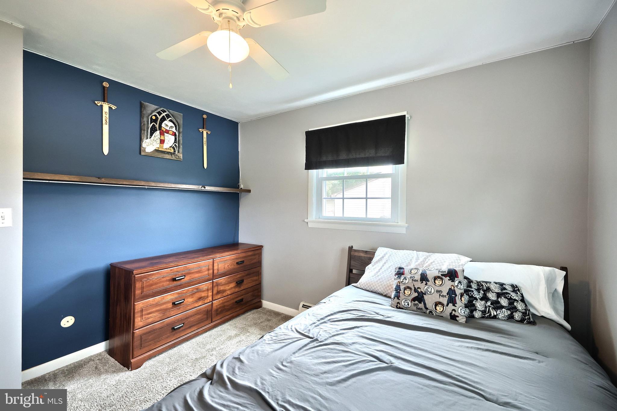 2569 Emig Mill Road Dover, PA 17315 - Photo 30 of 32 a bedroom with a bed and a window