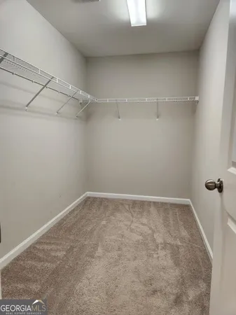 a view of a room with racks on the wall