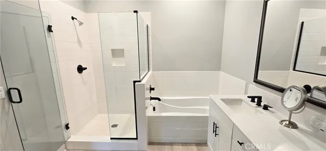 a view of room with wooden floor