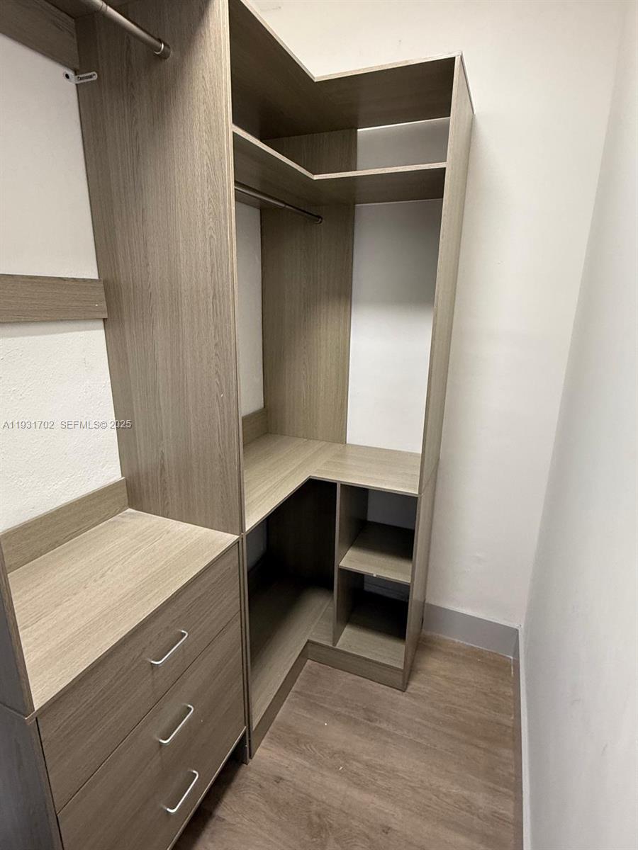 6790 Southwest 17th Street, Unit 6790 Miami, FL 33155 - Photo 4 of 7 a view of walk in closet