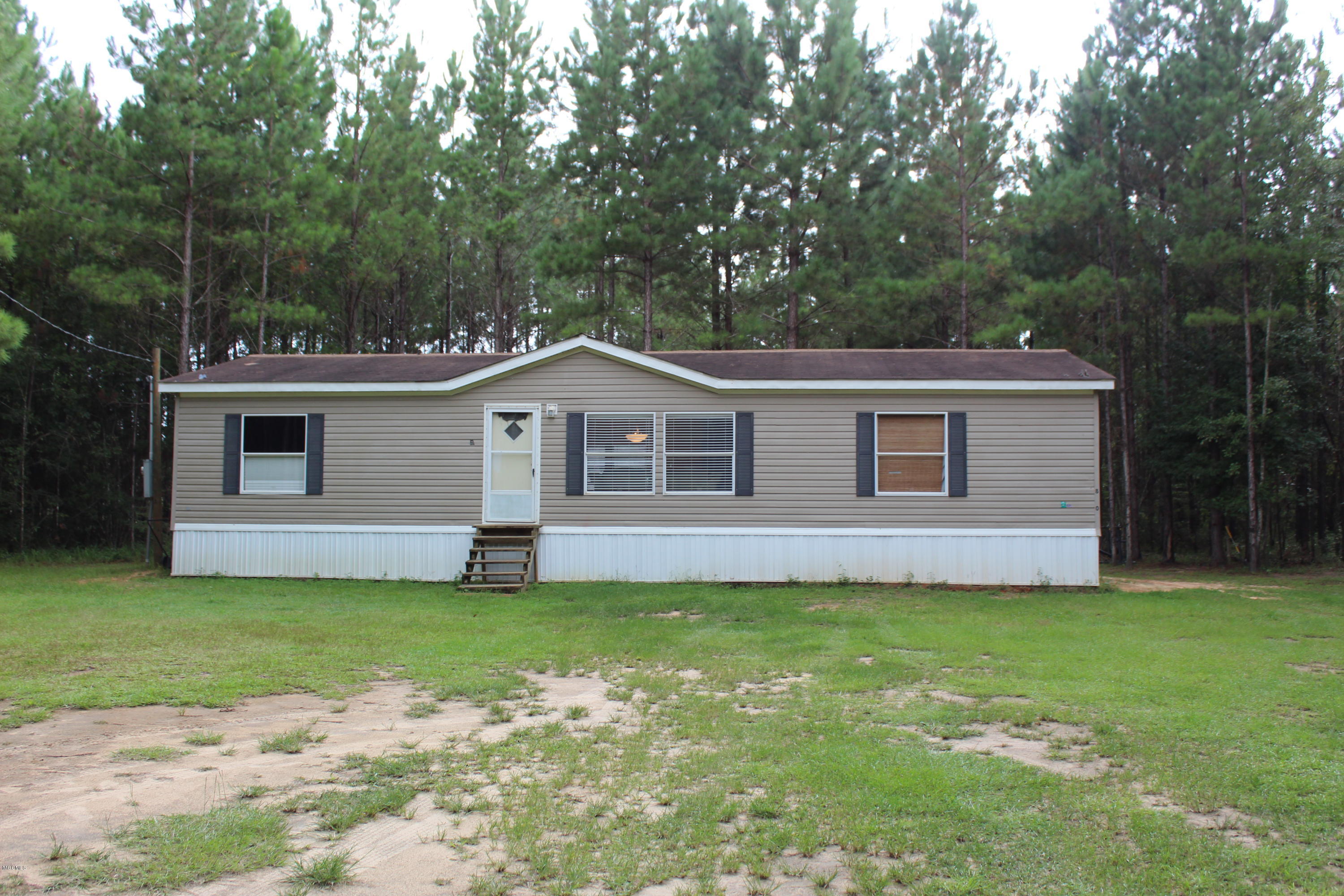 247 Gordon Road Lucedale, MS 39452 - Photo 1 of 22 IMG_2284