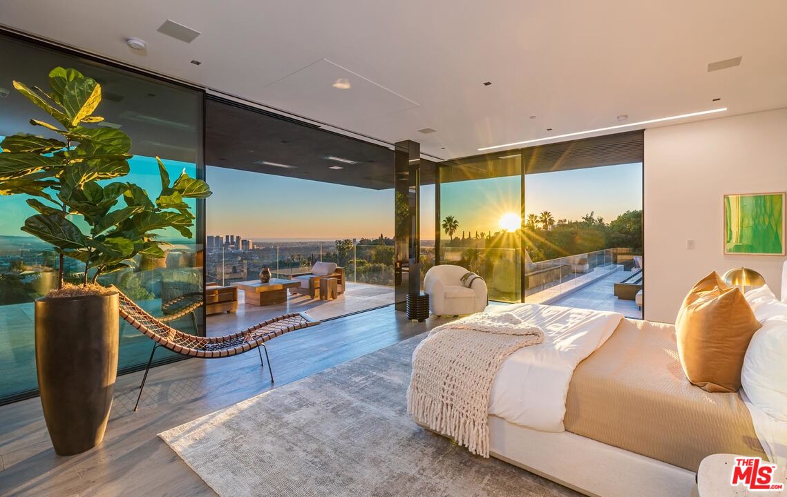 1108 Wallace Ridge Beverly Hills, CA 90210 - Photo 11 of 33 a bed room with a bed and a balcony