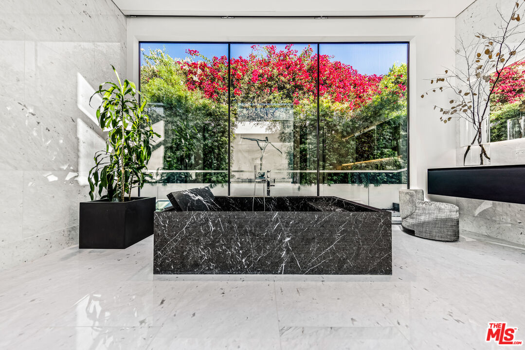 1108 Wallace Ridge Beverly Hills, CA 90210 - Photo 13 of 33 a living room with furniture and a potted plant
