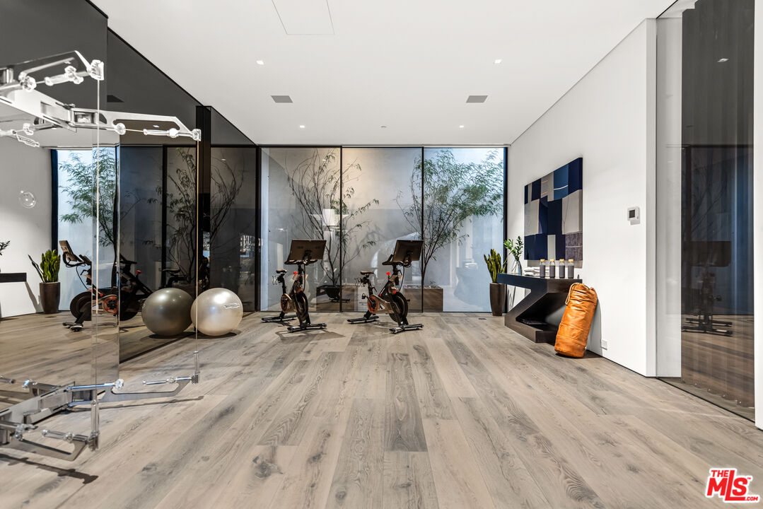 1108 Wallace Ridge Beverly Hills, CA 90210 - Photo 19 of 33 a view of a room with gym equipment