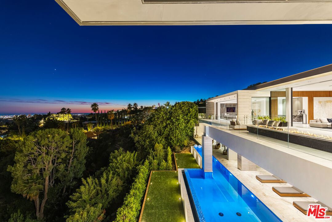 1108 Wallace Ridge Beverly Hills, CA 90210 - Photo 27 of 33 a view of a balcony with an outdoor seating