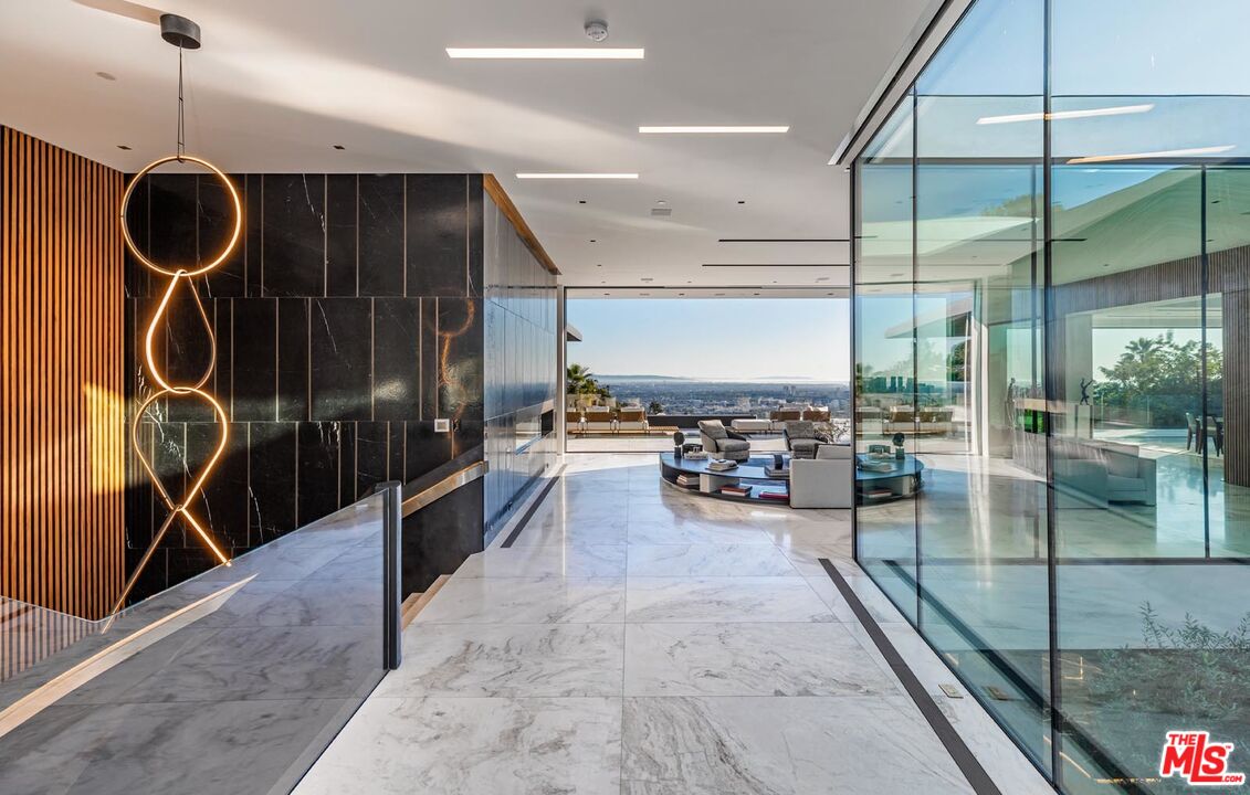 1108 Wallace Ridge Beverly Hills, CA 90210 - Photo 4 of 33 a lobby with furniture and floor