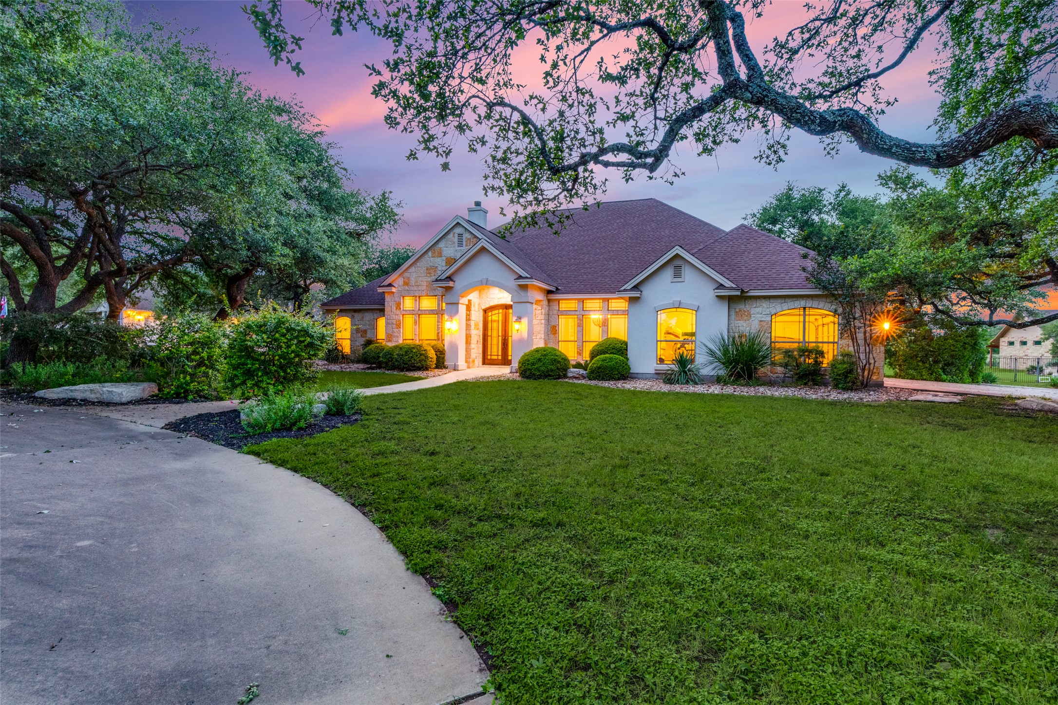 101 Copper Leaf Court Georgetown, TX 78633 - Photo 1 of 31 Stone and stucco exterior with an arched entryway