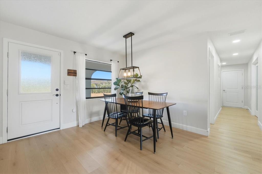 3454 Rambler Avenue St. Cloud, FL 34772 - Photo 14 of 24 a dining room with furniture and window