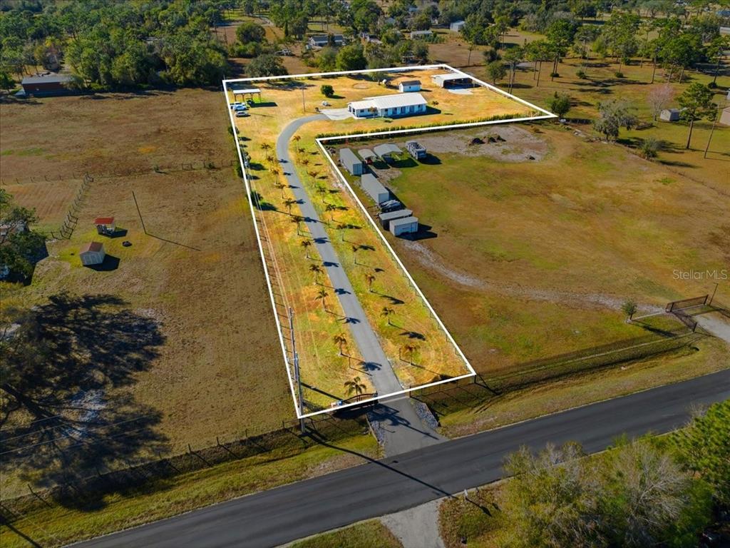 3454 Rambler Avenue St. Cloud, FL 34772 - Photo 2 of 24 a view of outdoor space with seating area