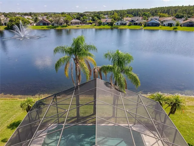 a view of a lake with a house