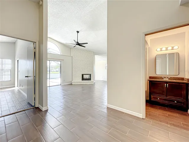 a view of a livingroom with a furniture and an entryway