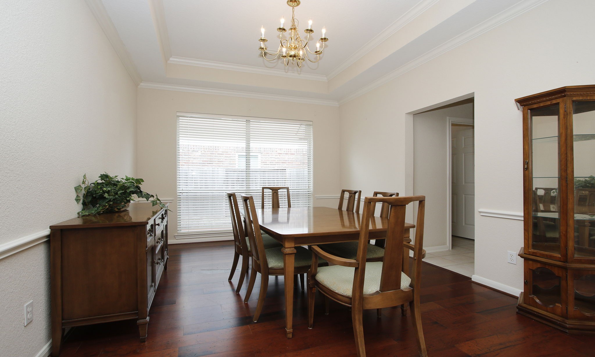 1114 Bringewood Chase Drive Spring, TX 77379 - Photo 9 of 44 Formal dining room. Wood floors and entry to kitchen crown molding