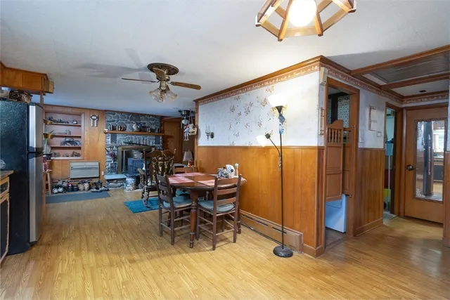 a view of a livingroom with furniture and a window