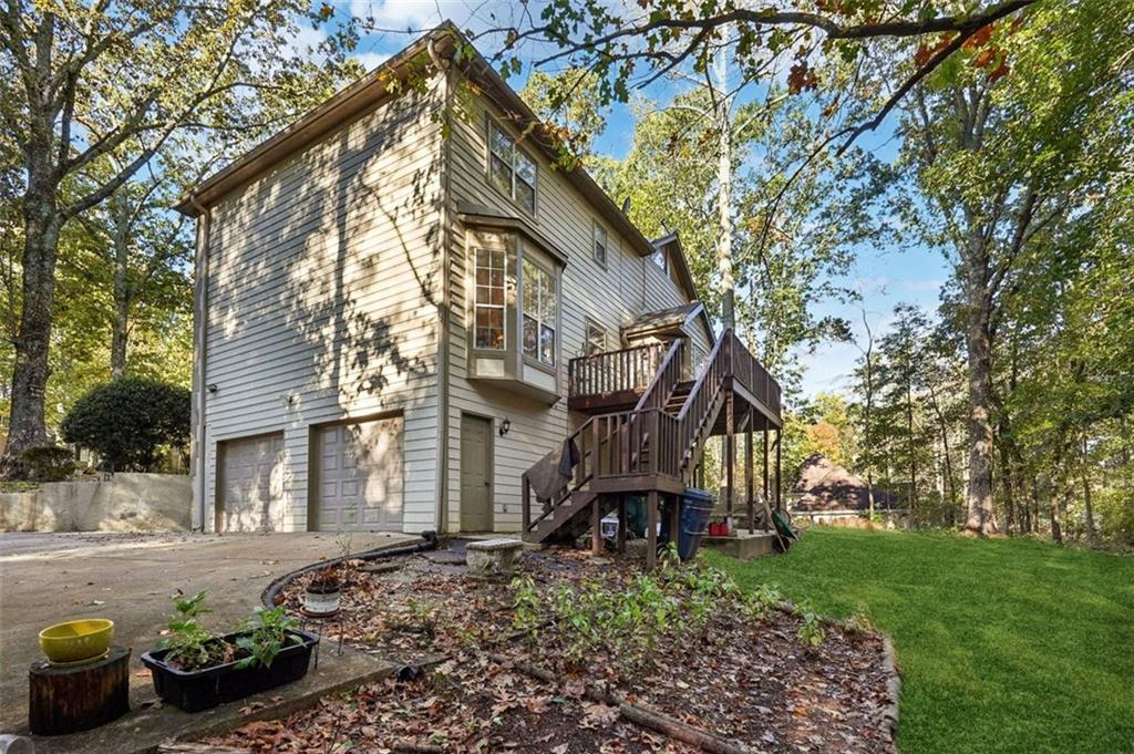 39 Hampton Way Carrollton, GA 30116 - Photo 49 of 57 a view of a house with backyard