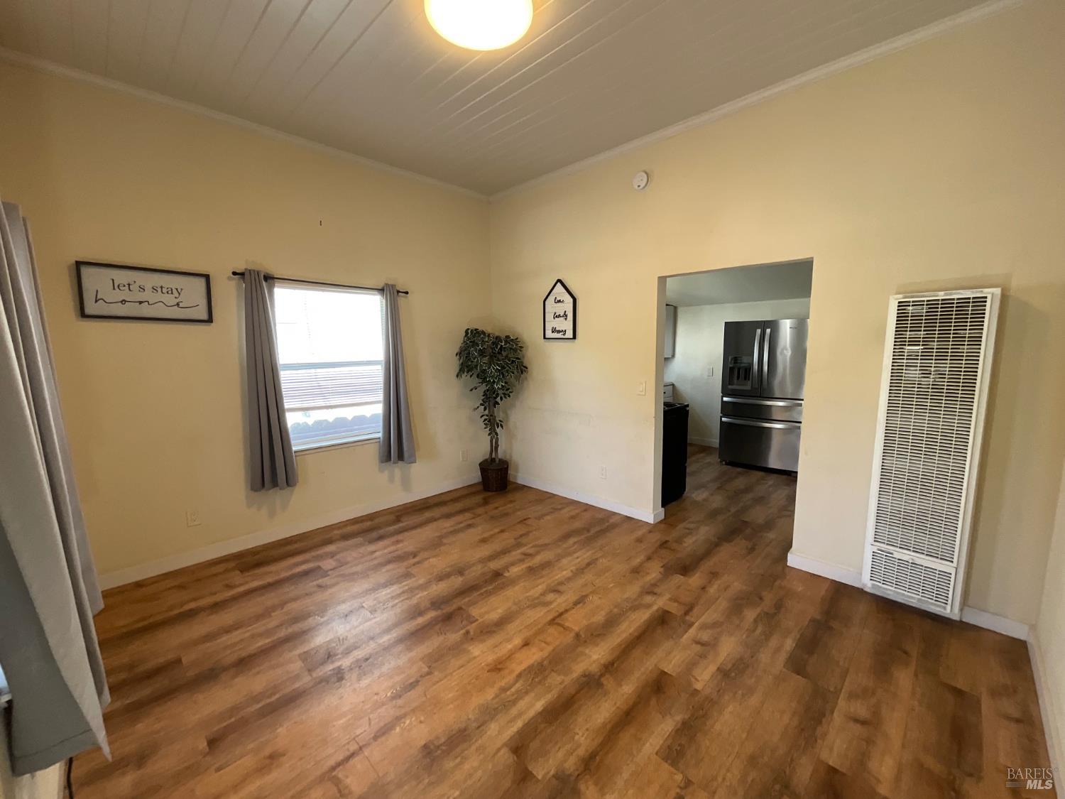 138 West 6th Street Santa Rosa, CA 95401 - Photo 6 of 31 Your living room is light and bright! The gas wall heater will keep you warm all winter long.