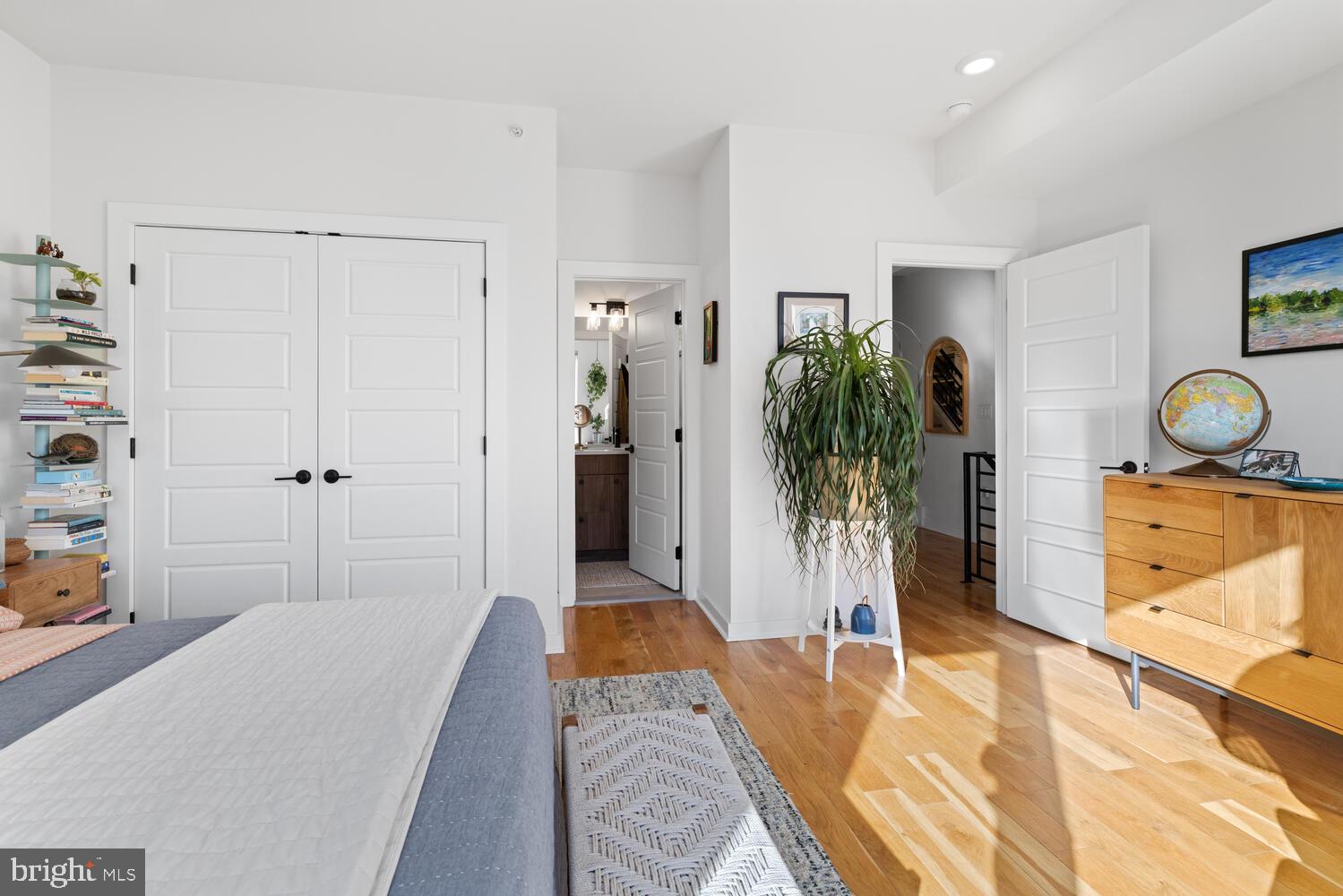 23 East Durham Street, Unit C2 Philadelphia, PA 19119 - Photo 17 of 40 a bedroom with a bed and a potted plant