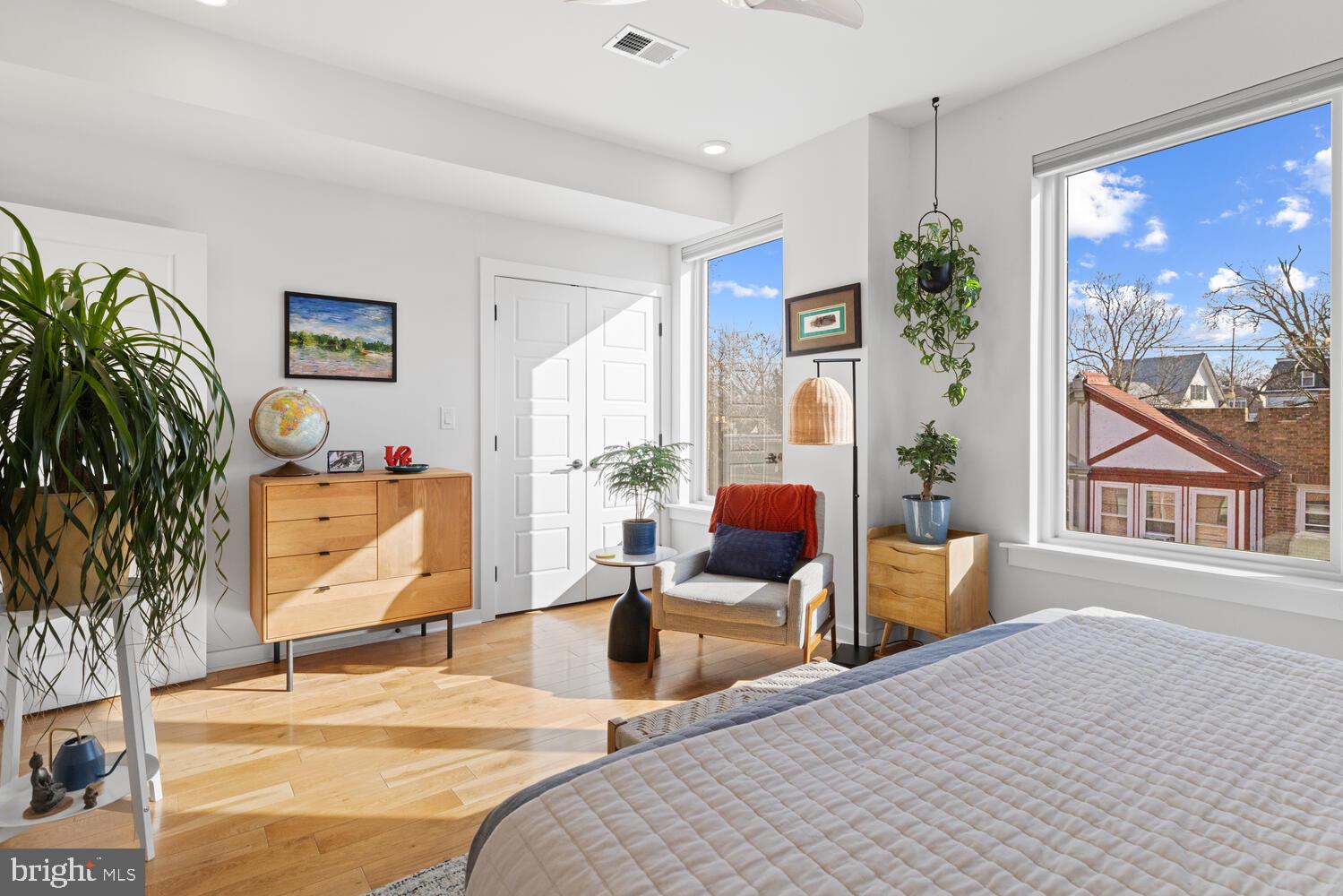 23 East Durham Street, Unit C2 Philadelphia, PA 19119 - Photo 18 of 40 a bedroom with a bed and wooden floor