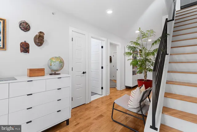 a bedroom with a bed and cabinets