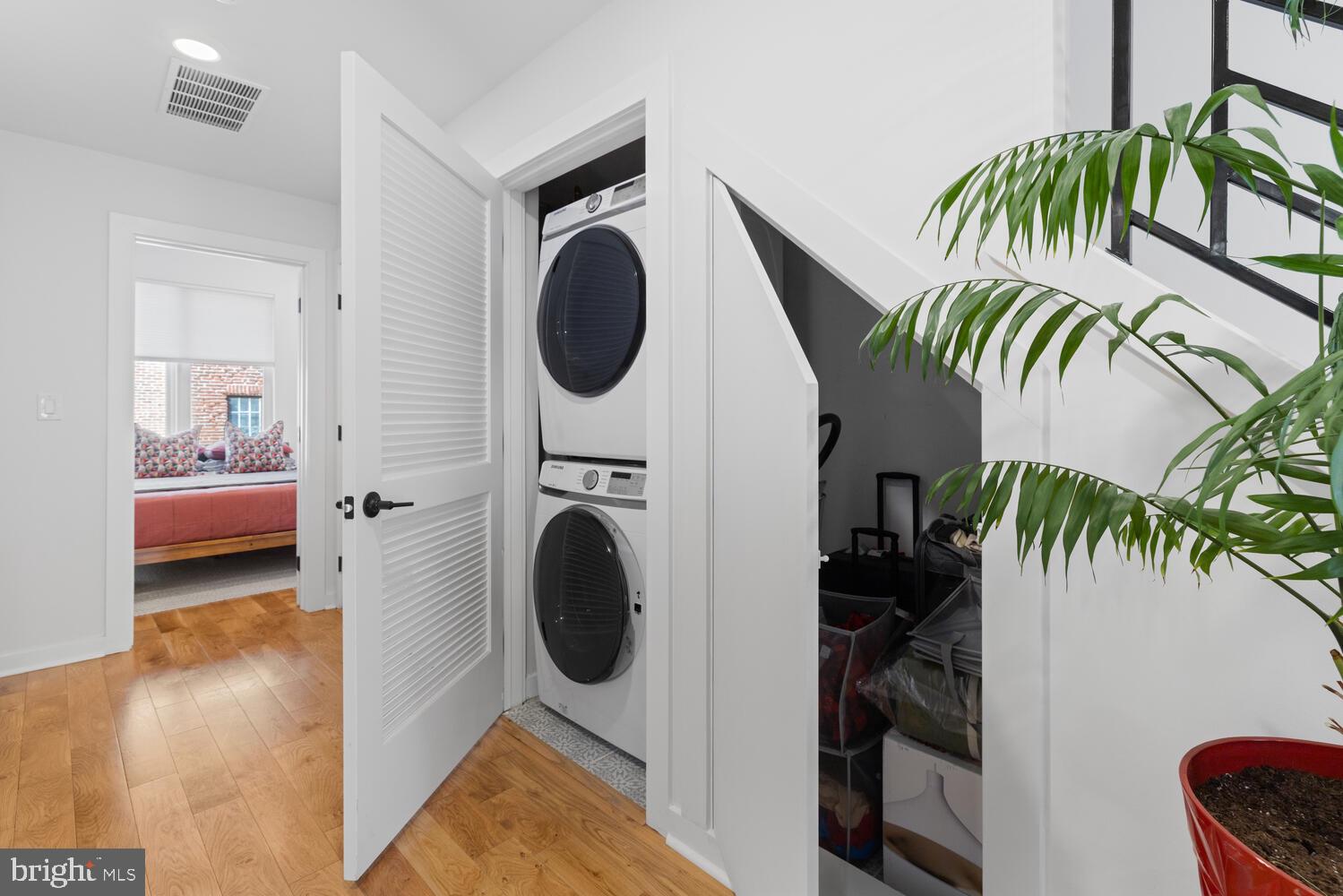 23 East Durham Street, Unit C2 Philadelphia, PA 19119 - Photo 25 of 40 a view of a hallway with washer and dryer